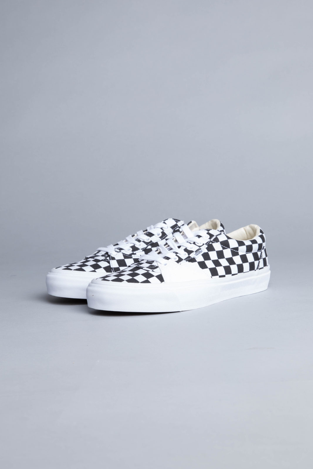 black true white checkered vans