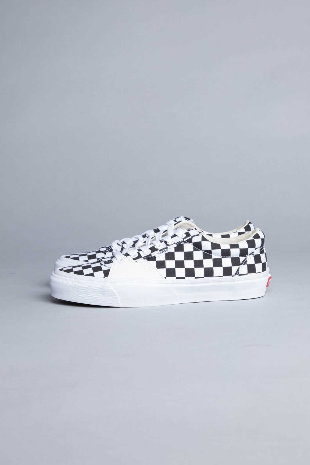 checkered vans black and true white