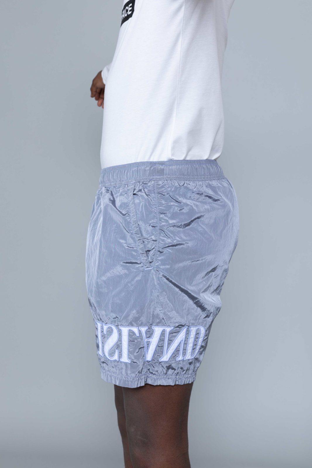 lavender stone island shorts