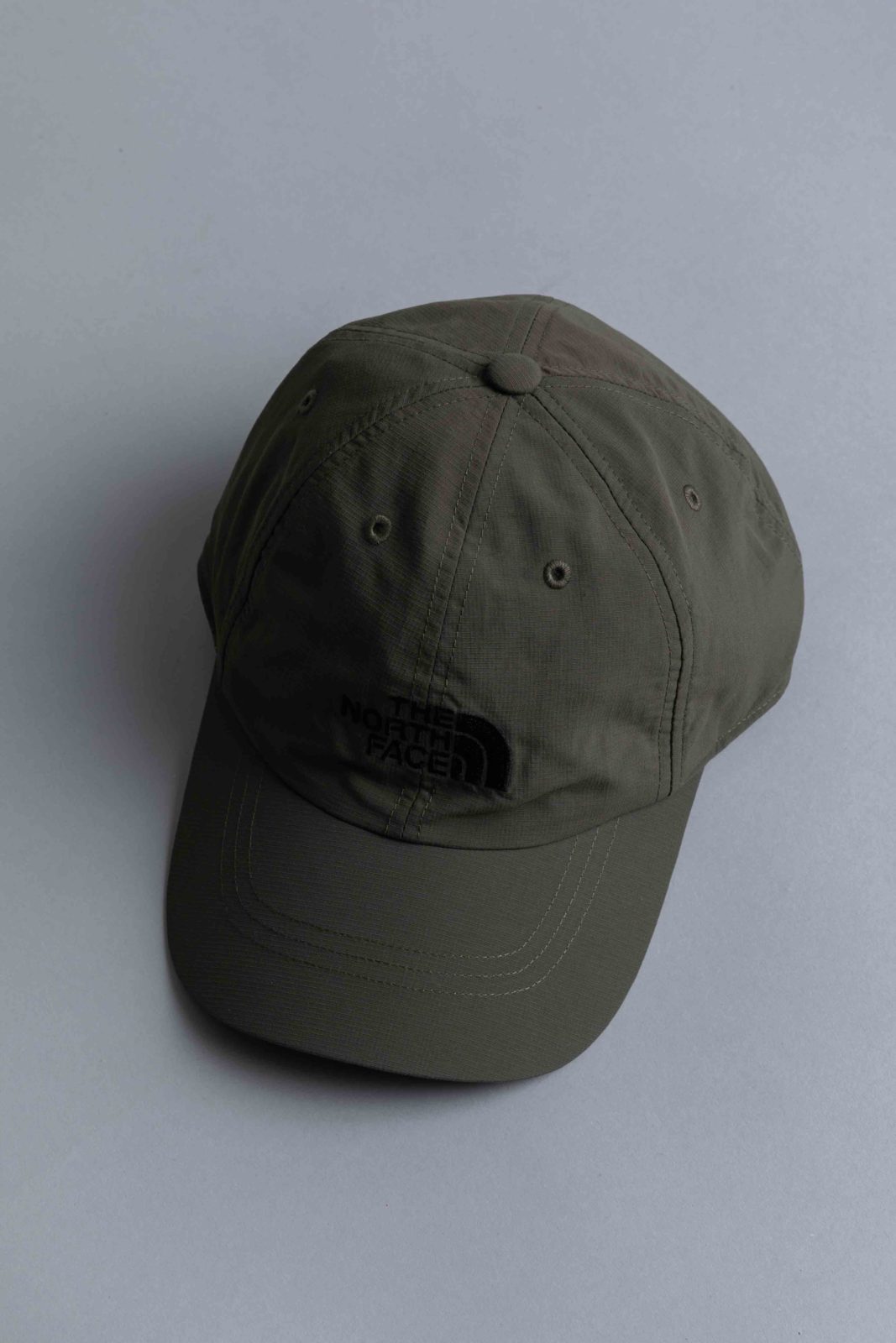 green north face cap