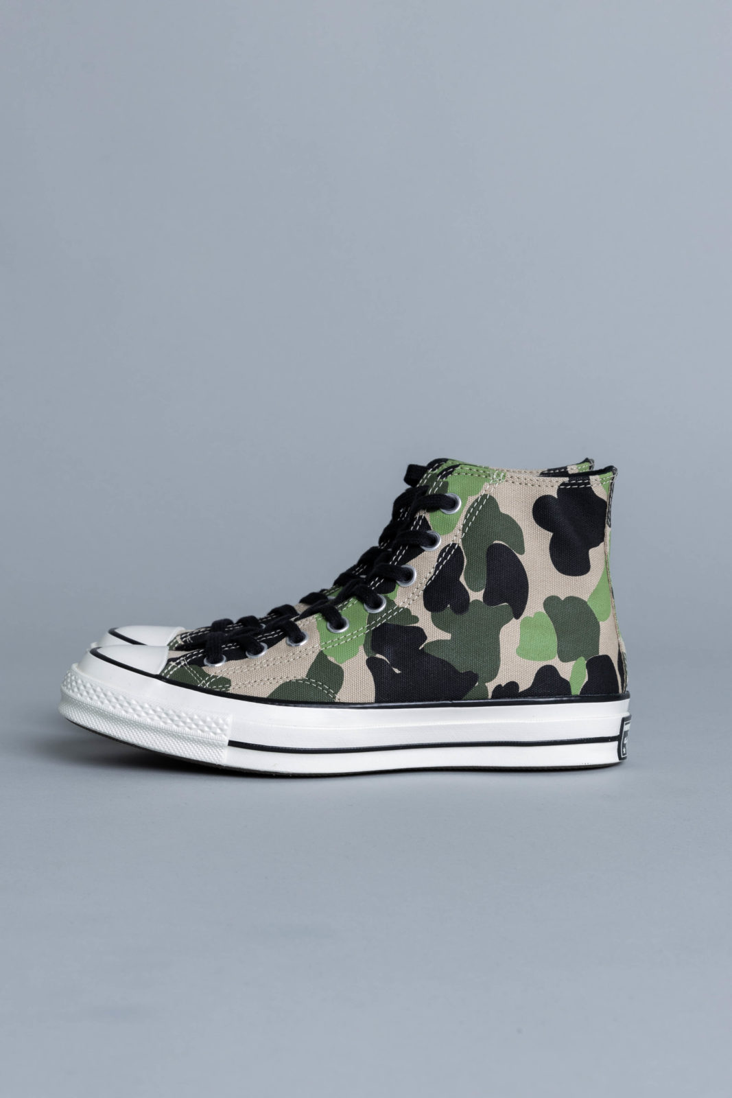 green and cream converse