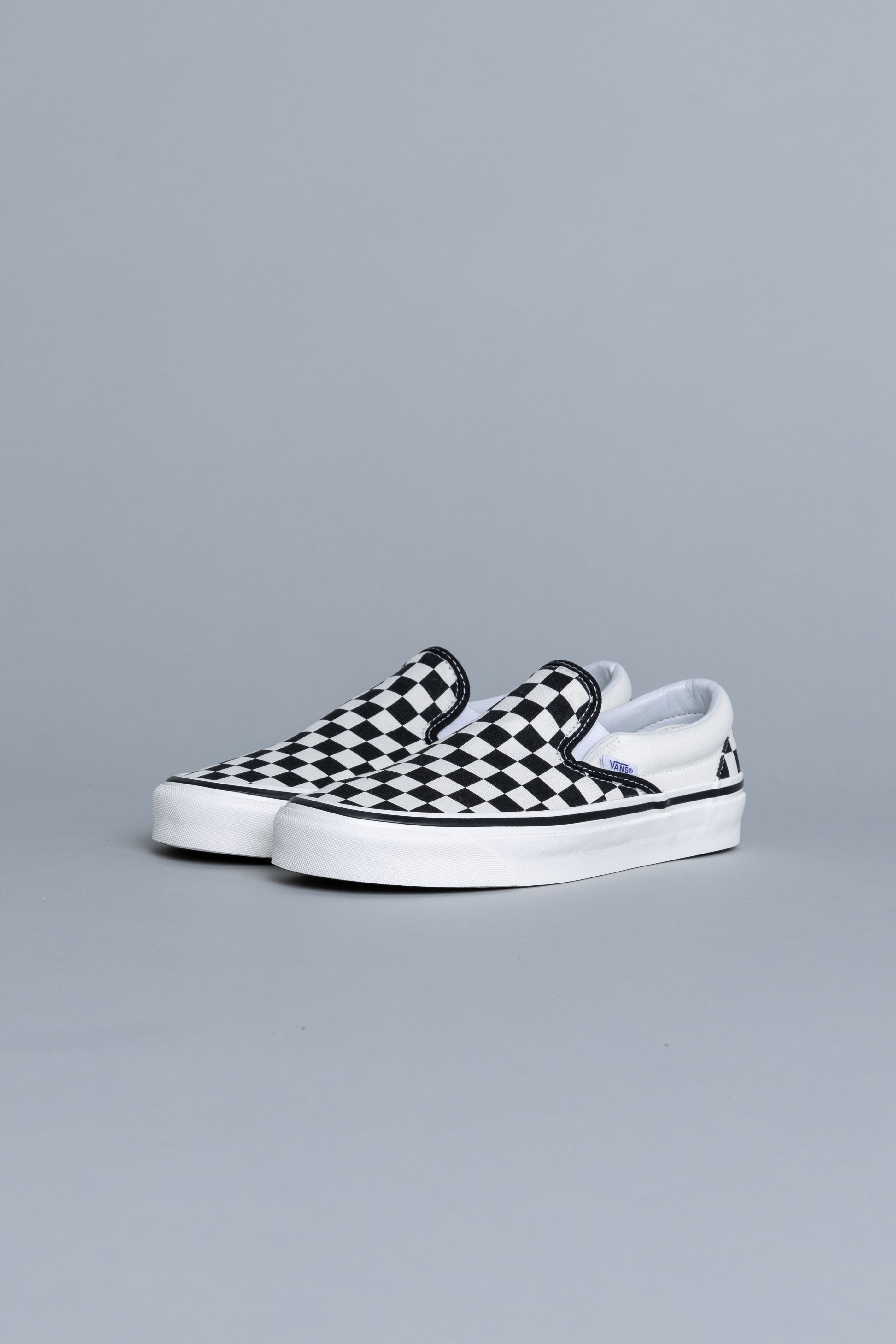 vans checkerboard old skool slip on