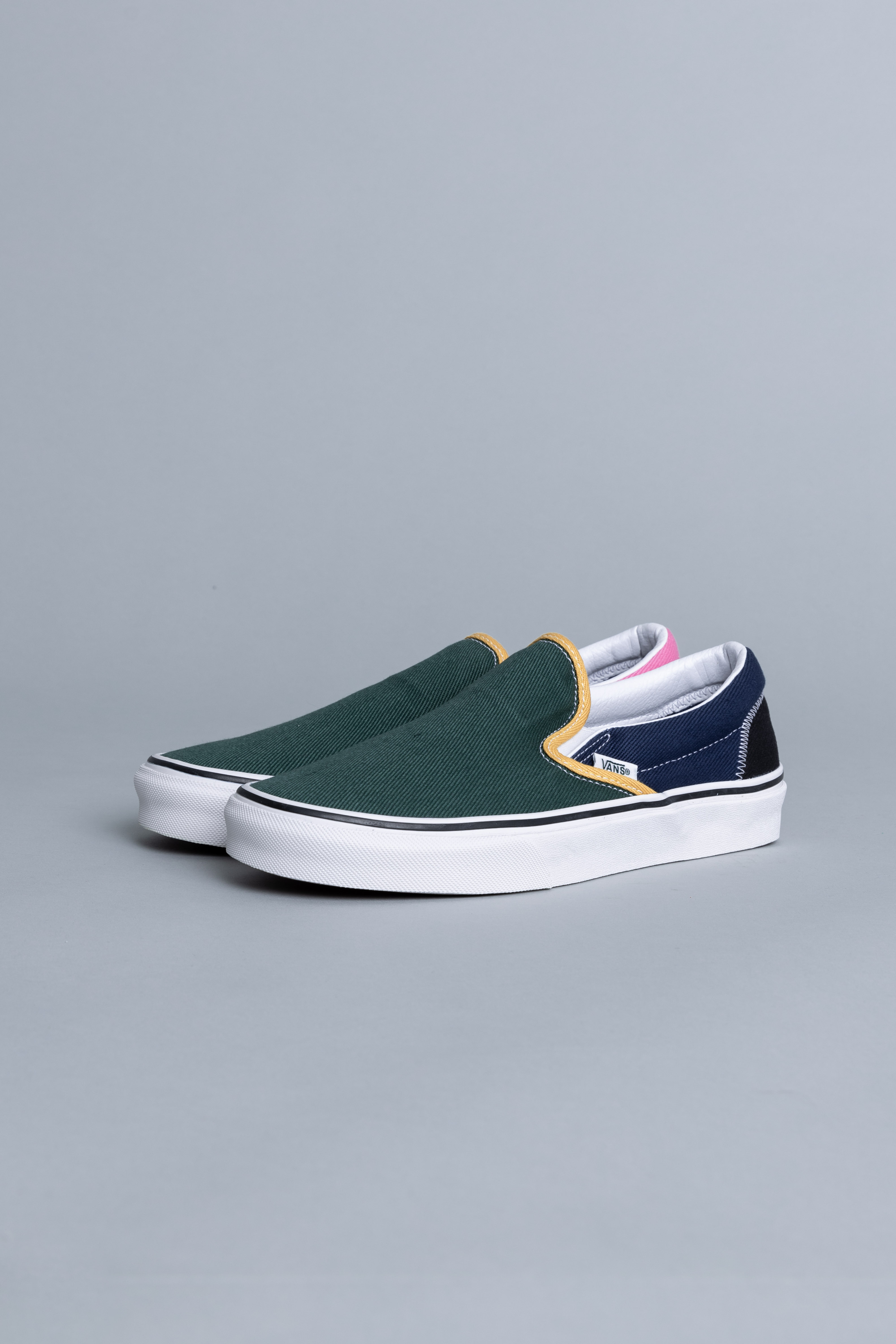 varsity vans slip on