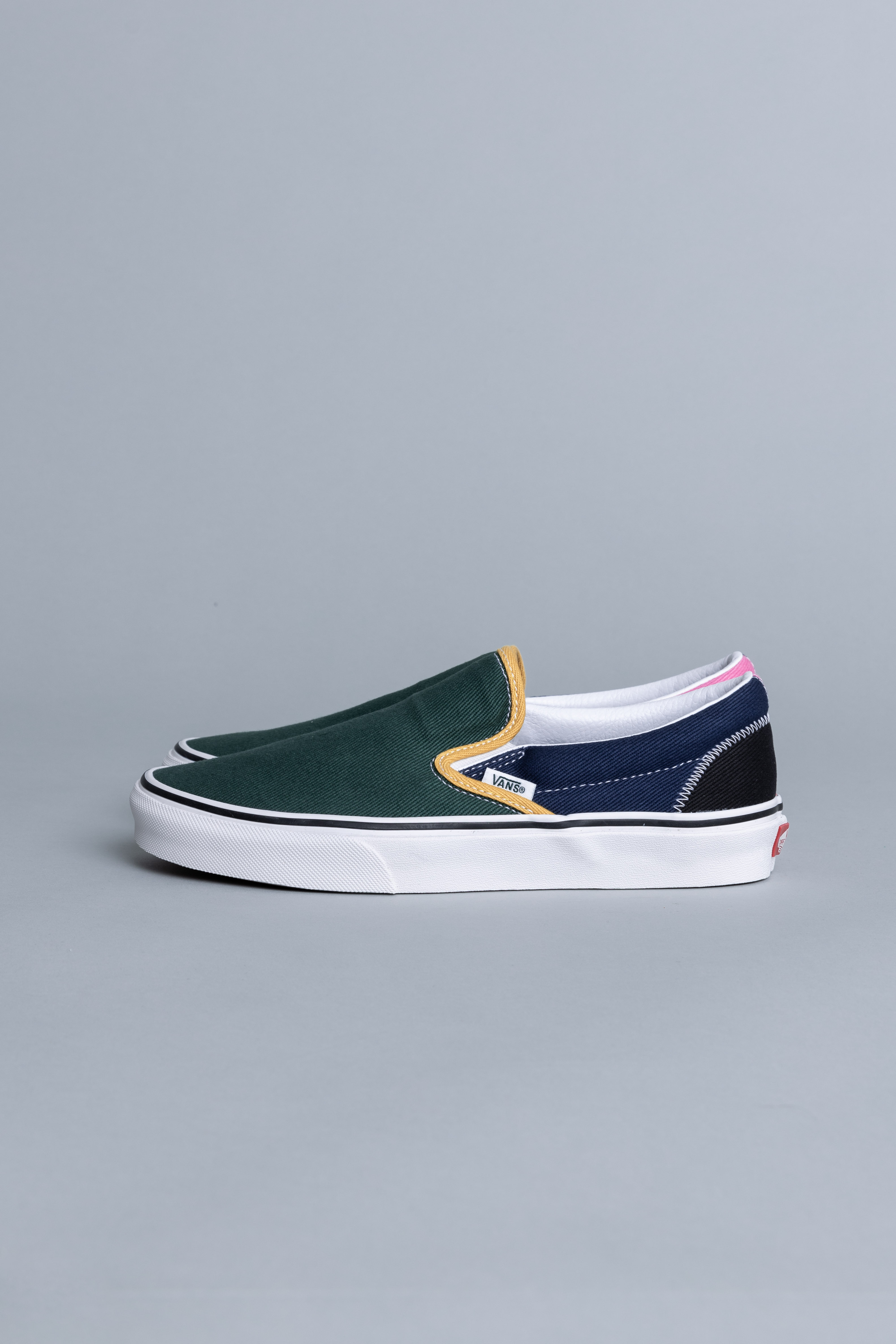 varsity vans slip on