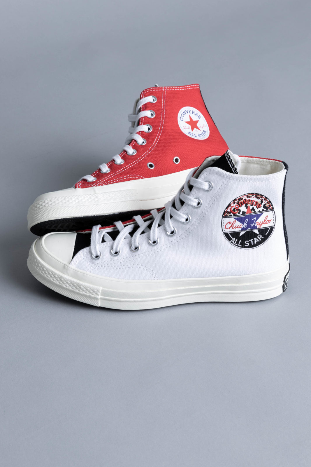 white and red chuck taylors
