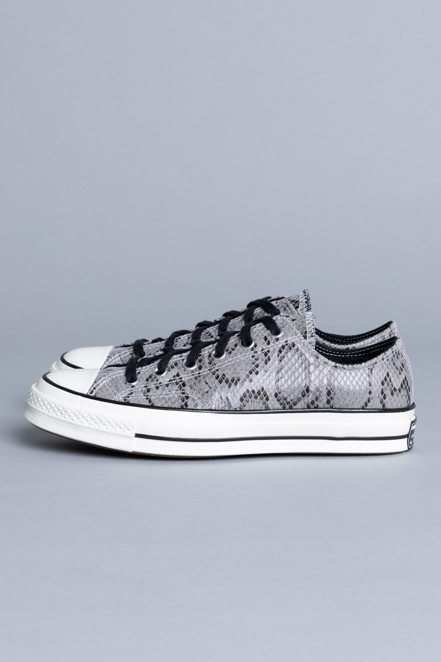 converse reptile leather