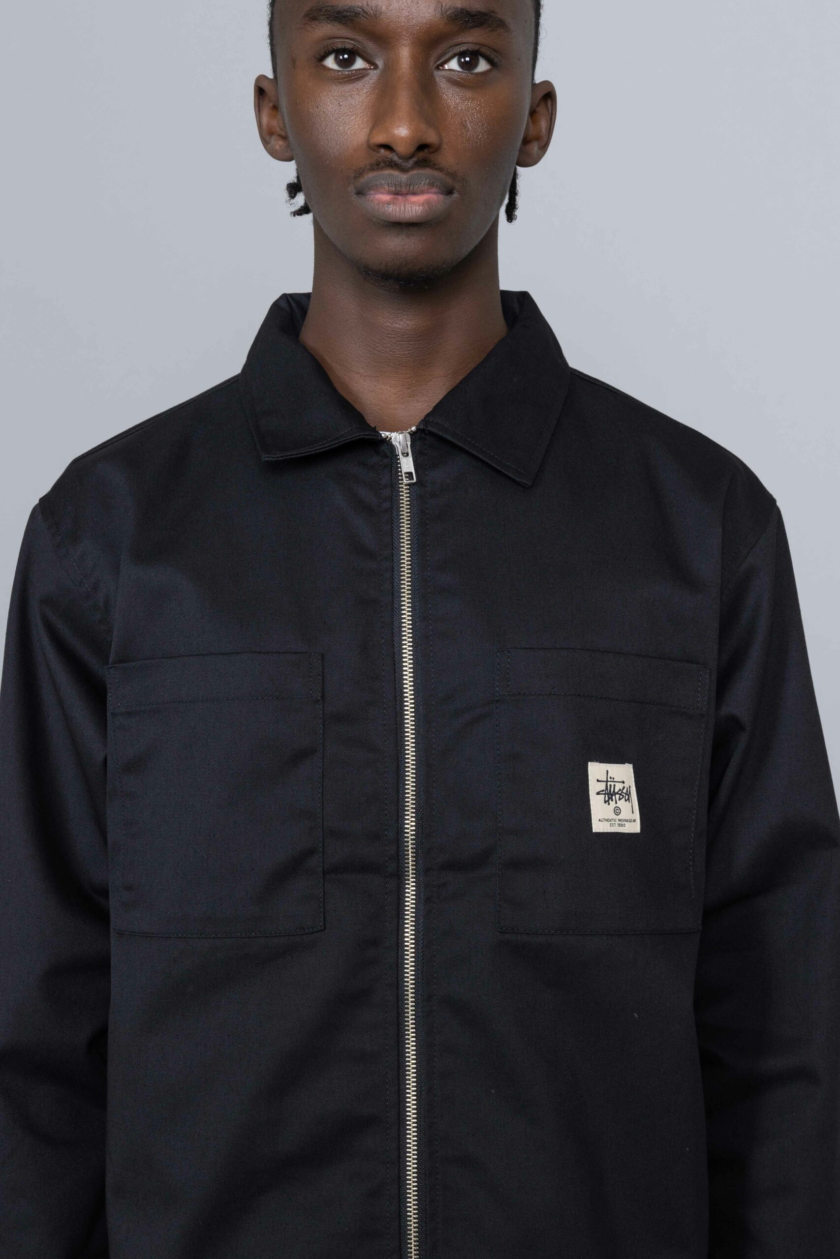 black zip up shirt