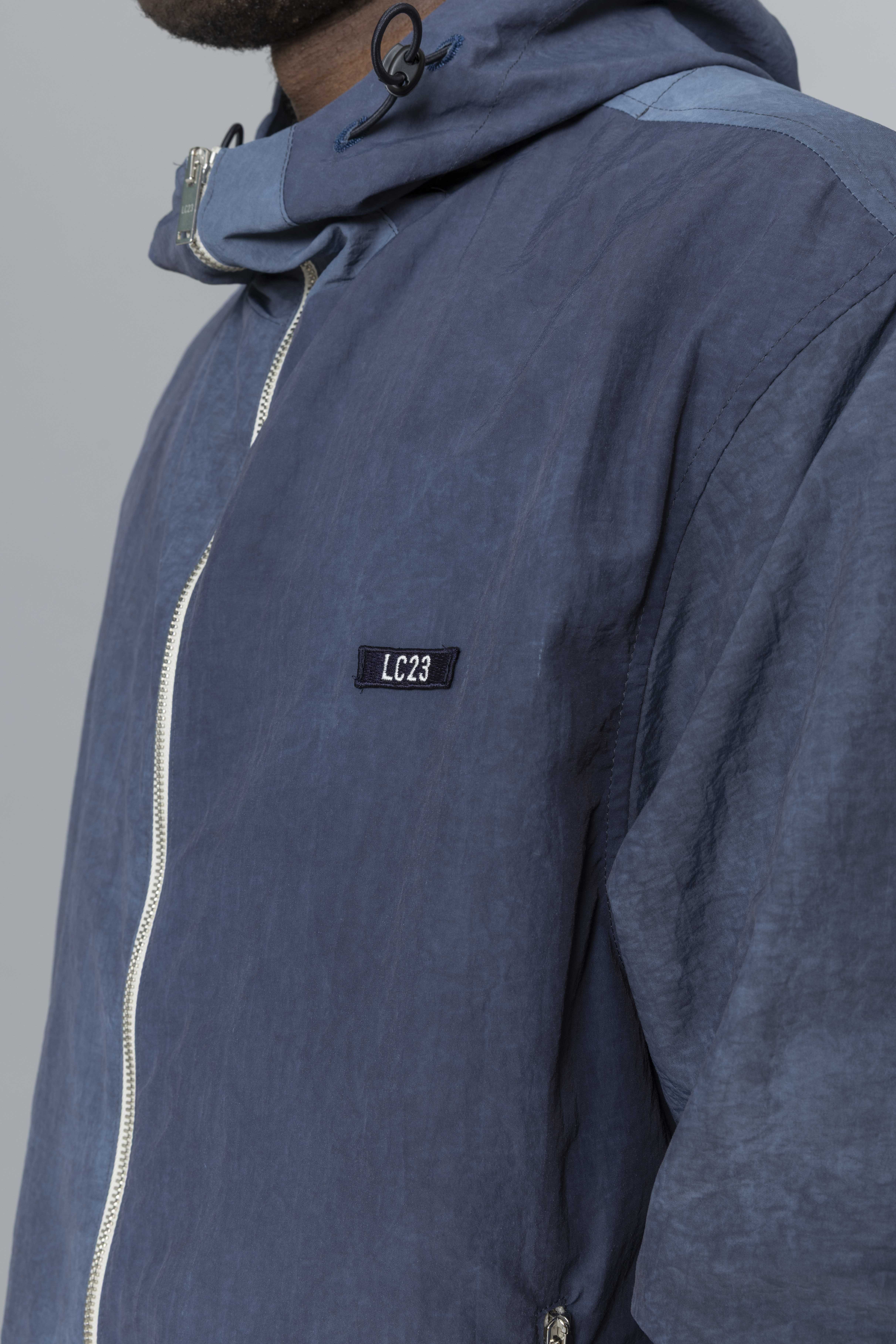 LC23WASHEDNYLONHOODEDJACKETNavyLogo