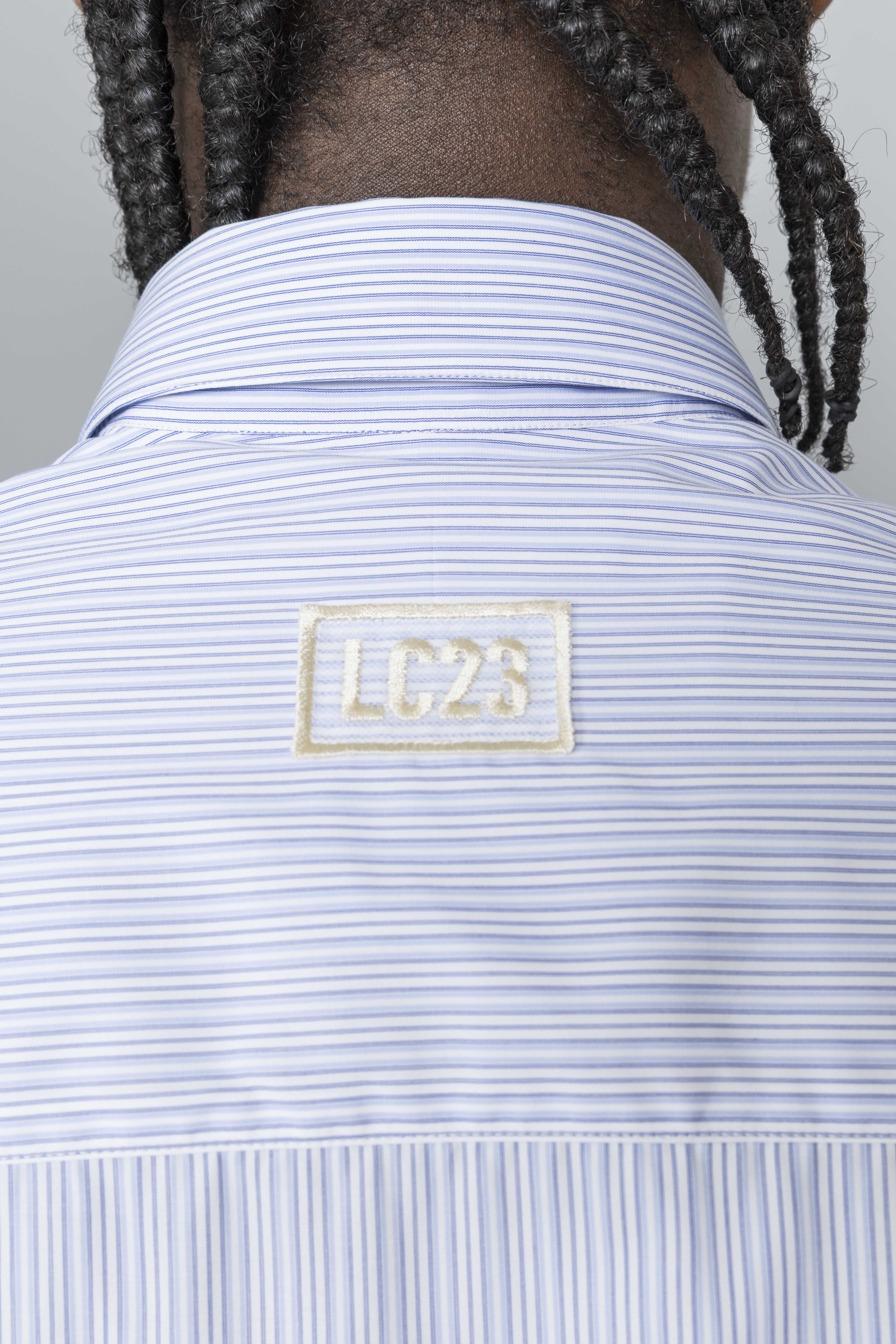 LC23ZIPSTRIPESSHIRTPaleBlueWhiteLabel