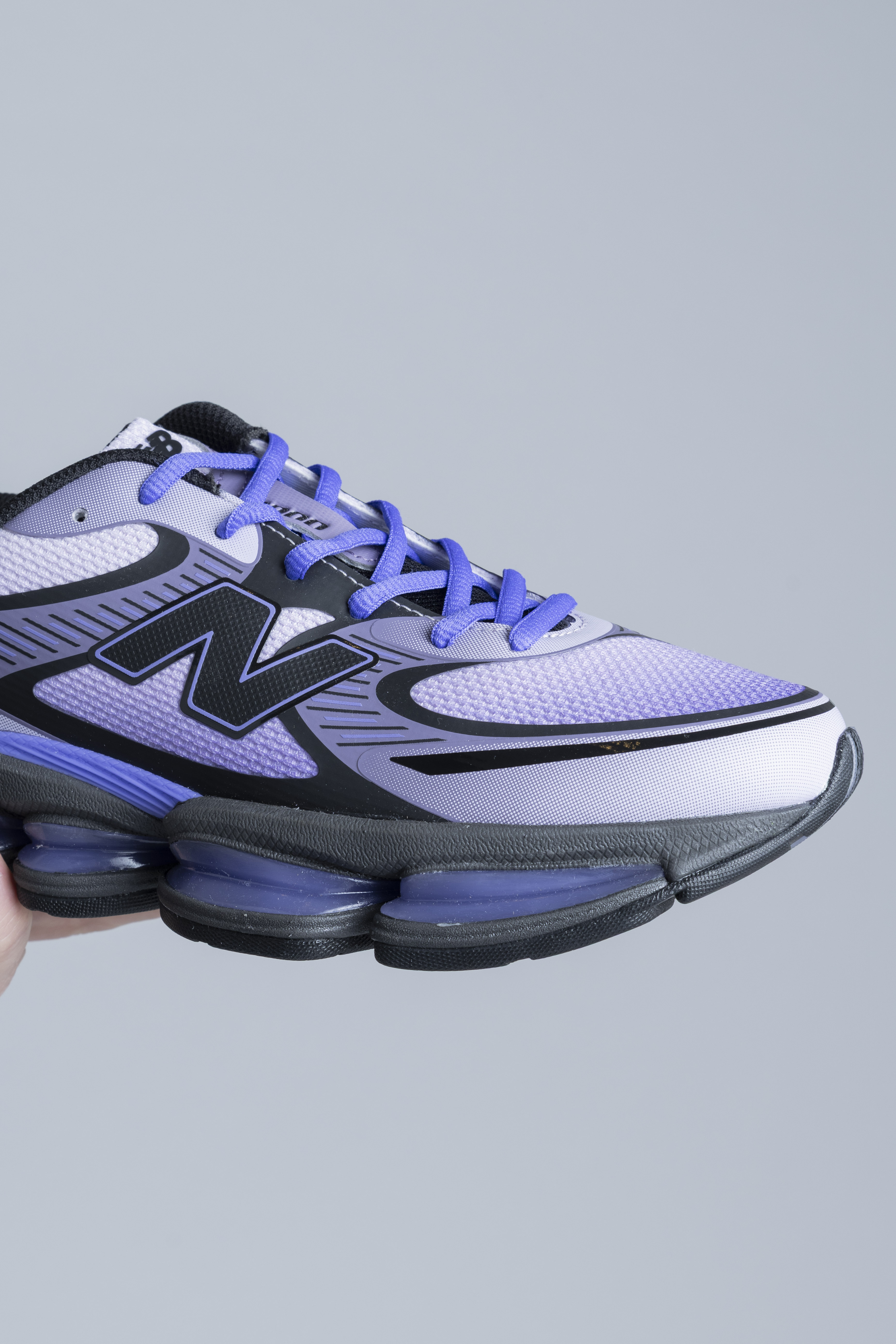 NewBalanceAbzorb2000TaroElectricIndigoNose